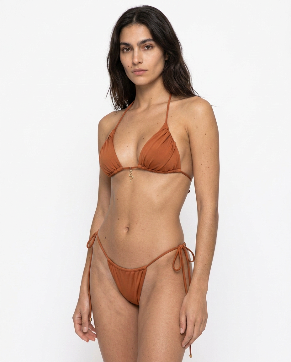 Front view of the May Rose Sofia Patchouli camel bikini set featuring a draped triangle top with tie straps, 18K gold-plated snake charm and tie-side thong bottom