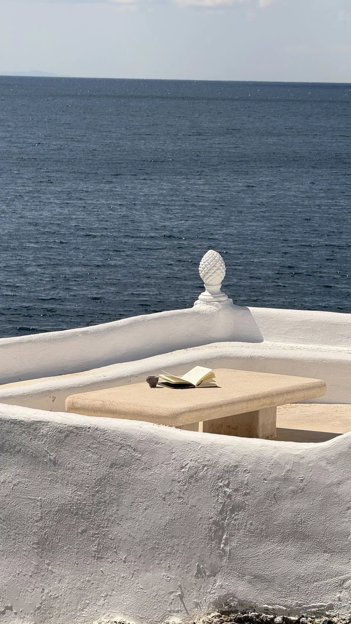 sea view in mykonos with white cycladic architecture overlooking the aegean sea